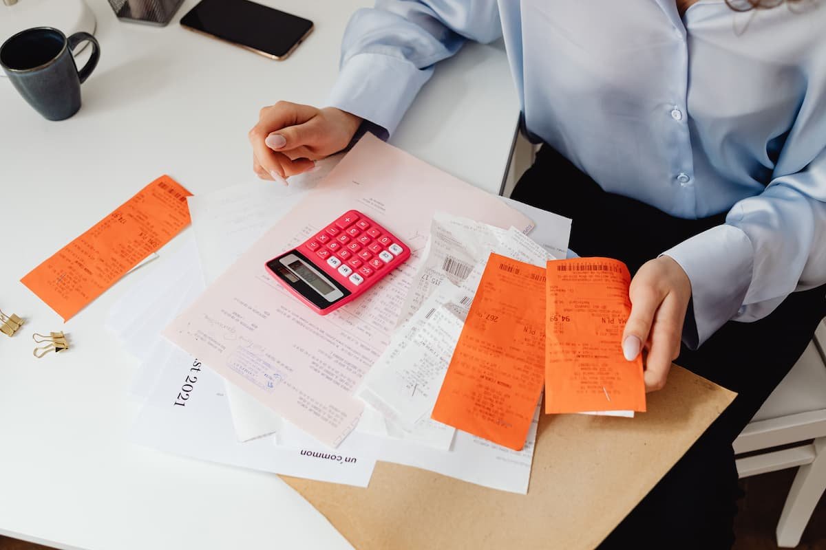 Medical billing specialist reviewing claims and payments as part of revenue cycle management